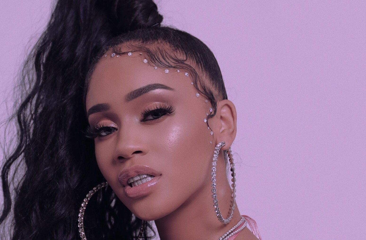 Saweetie (American Rapper) ()