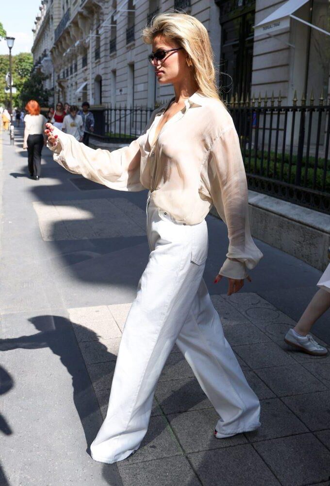 Brooks Nader turns heads exiting YSL store 