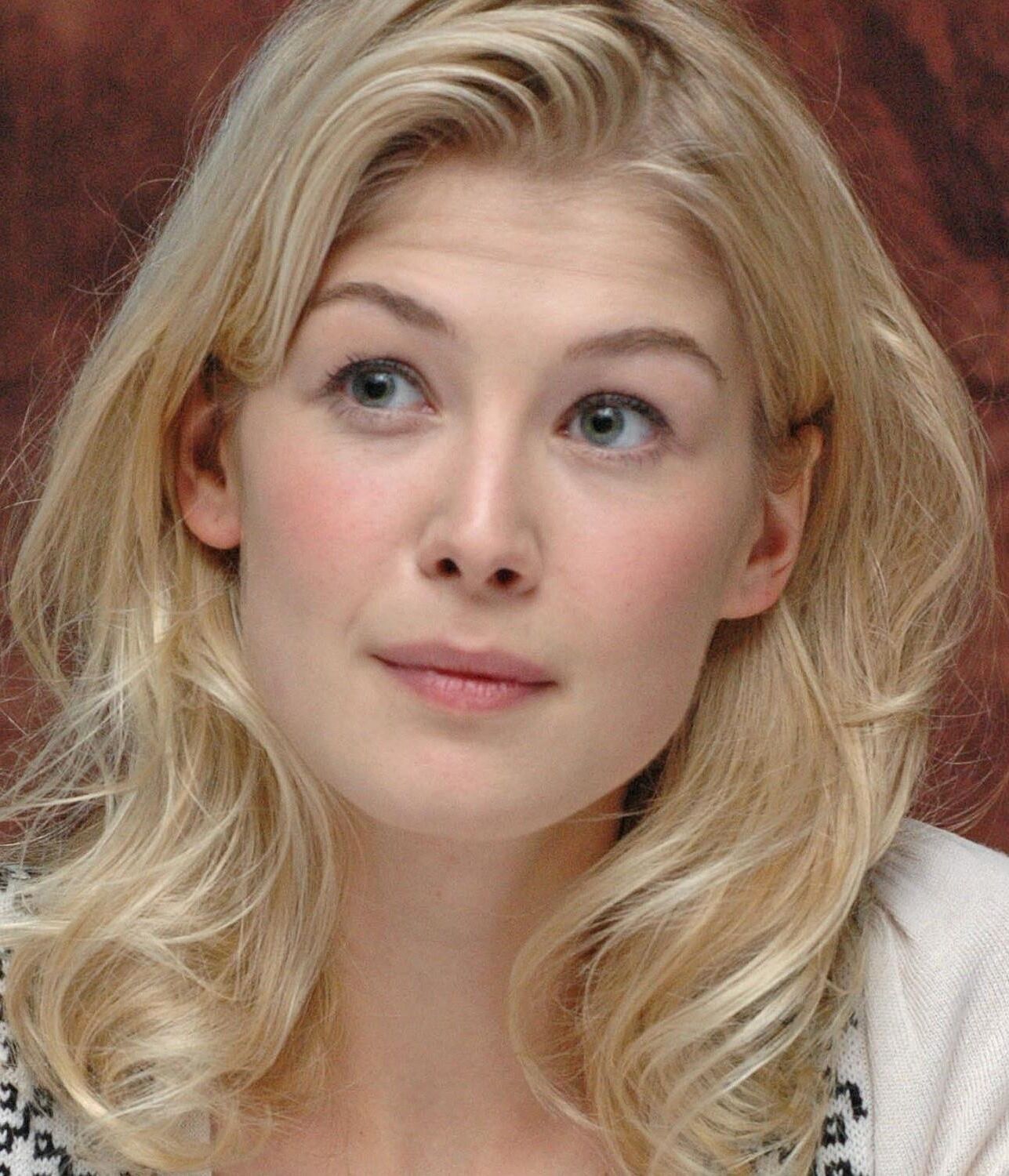 Rosamund Pike excitant les photos