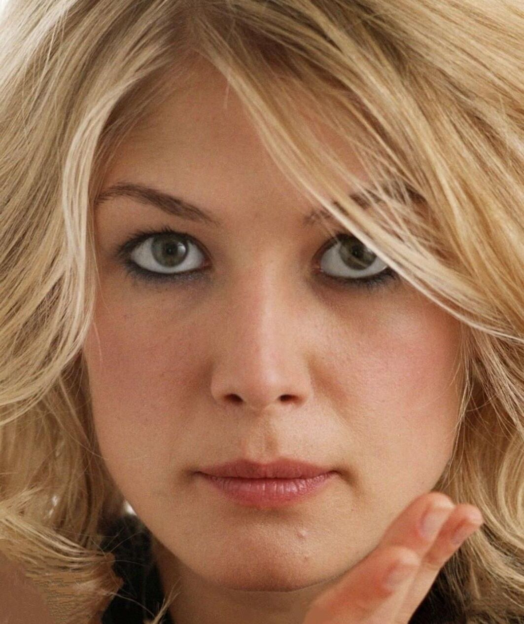 Rosamund Pike excitant les photos