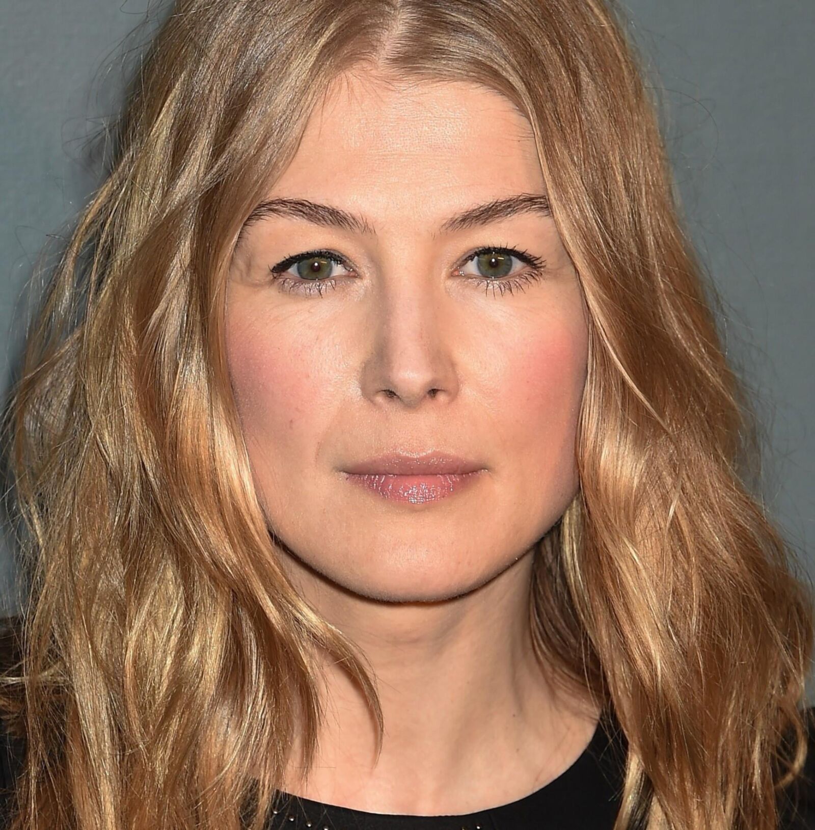 Rosamund Pike excitant les photos