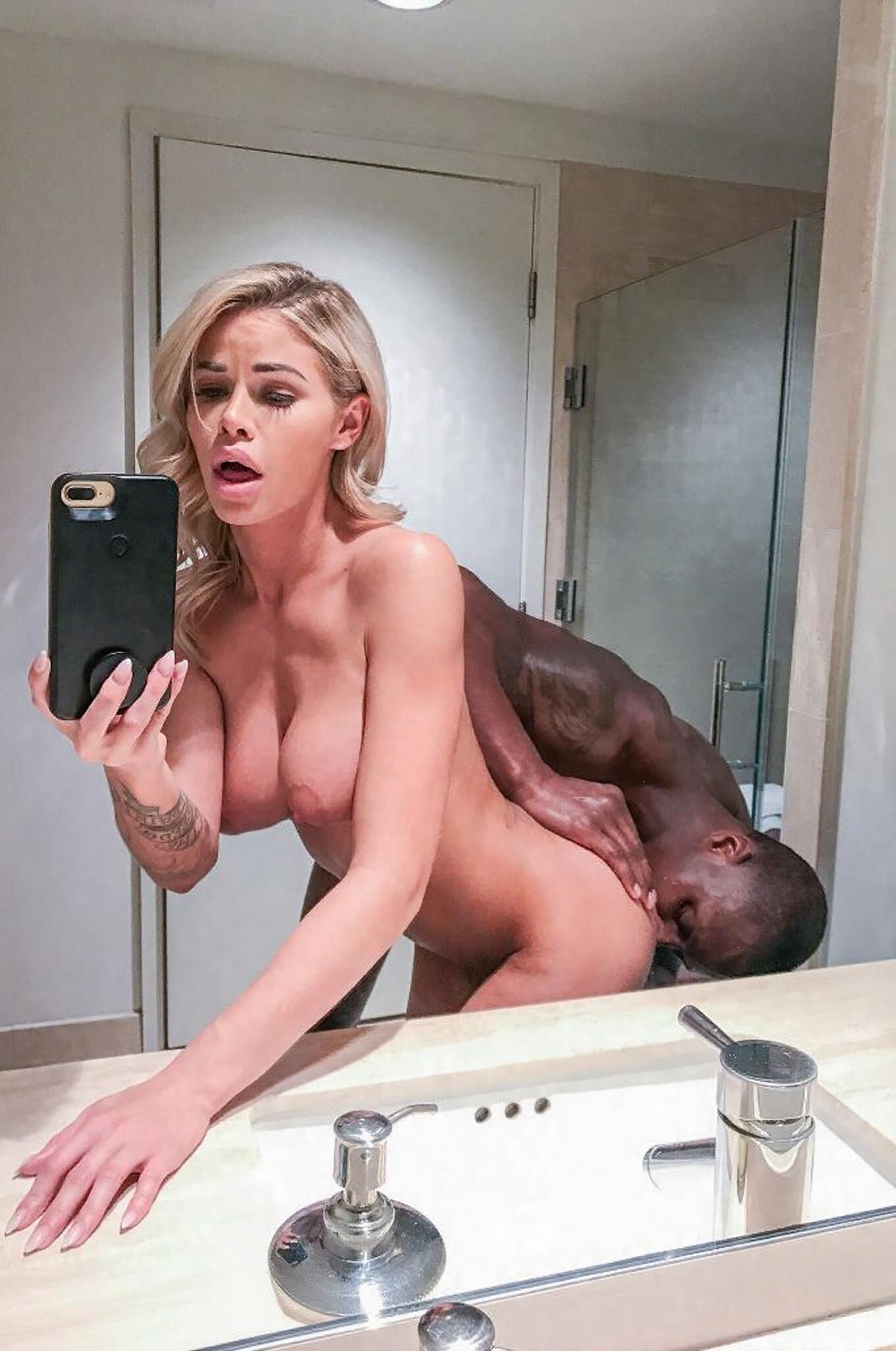 Sexy Baddies Posing with Black Bulls []