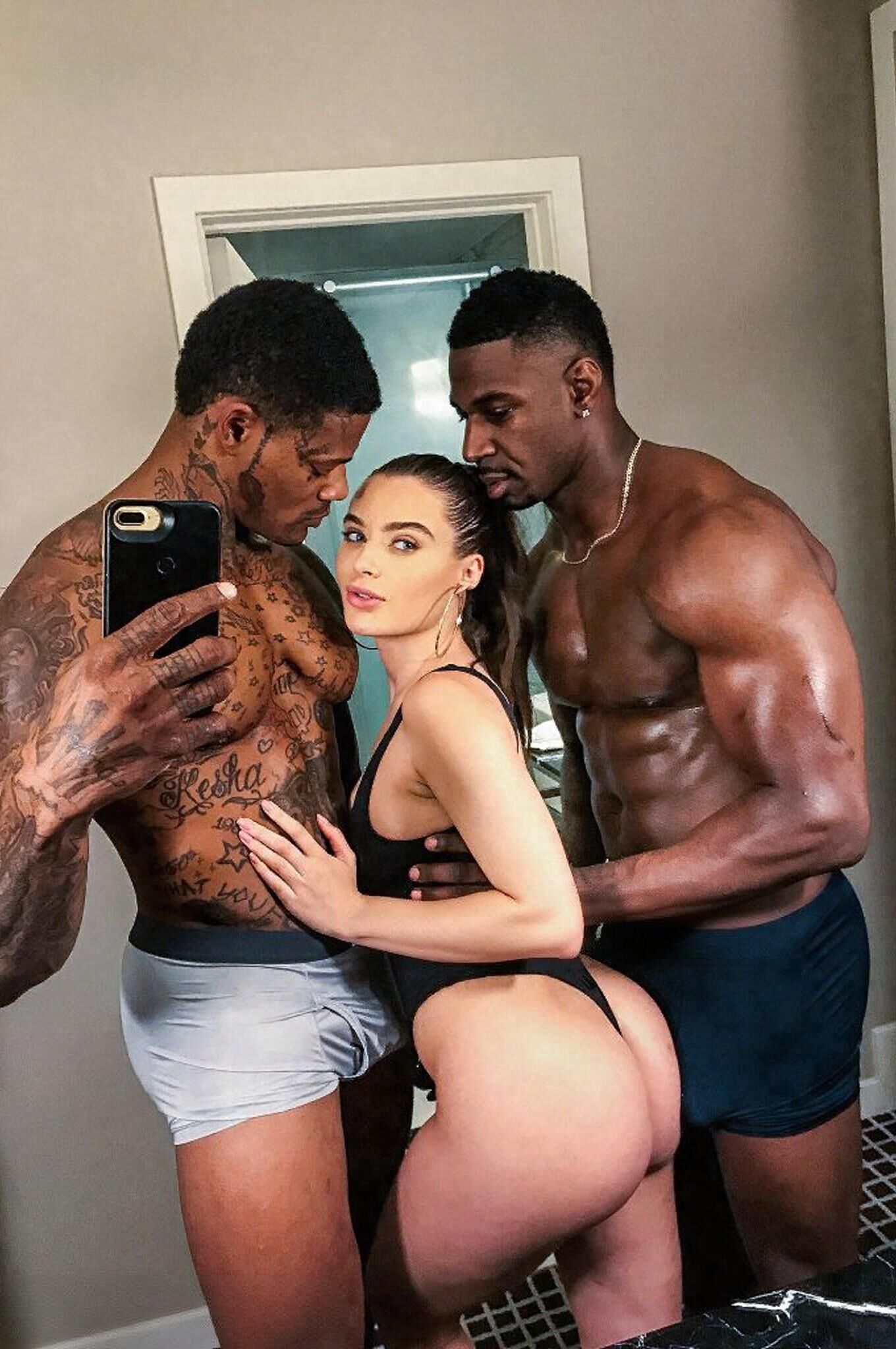Sexy Baddies Posing with Black Bulls []